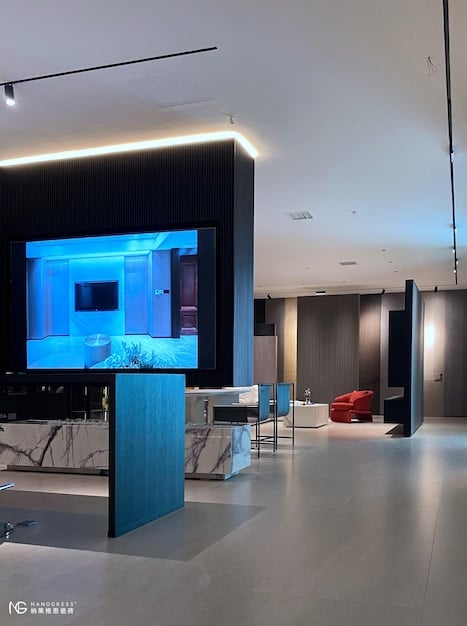 A modern office space utilizing a combination of recessed LED lighting and decorative OLED panels, showcasing the aesthetic and energy-saving benefits of both technologies.