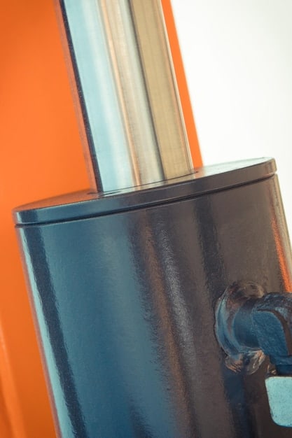 A detailed, close-up view of the internal components of a tankless water heater, showing the heat exchanger, burner, and flow sensor. Highlighting the complexity and engineering involved in the heating process.