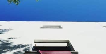Energy-Efficient Roofs: Cool Roofs & Lower AC Bills - Cover Image