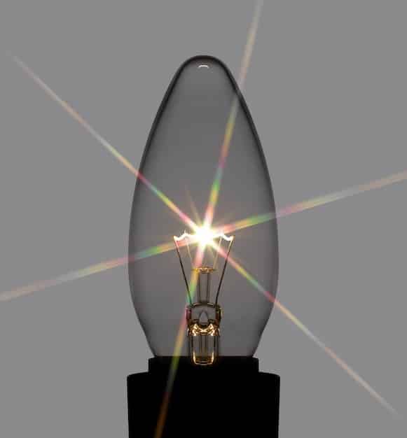 A side-by-side comparison of an old incandescent bulb and a modern LED bulb, highlighting the difference in size and the 