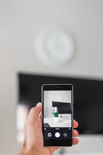 A smart home security camera recording a high-definition video, with a clear display of motion detection alerts on a smartphone screen, demonstrating the system's real-time monitoring capabilities.