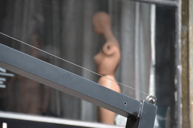 A close-up of a smart blind motor and mechanism, showing the intricate details of its design and construction. The focus is on the precision and technology involved in automating window treatments.