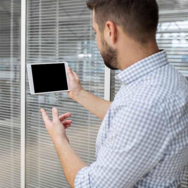 A person using a smartphone app to control their automated blinds, showing a user-friendly interface with options to open, close, and schedule the blinds.