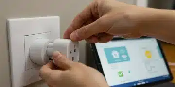 Hands installing smart plug for a beginner smart home project